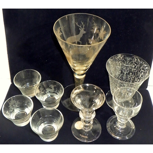 597 - A large etched stemmed glass together with four similar small shot glasses, two Georgian port glasse... 