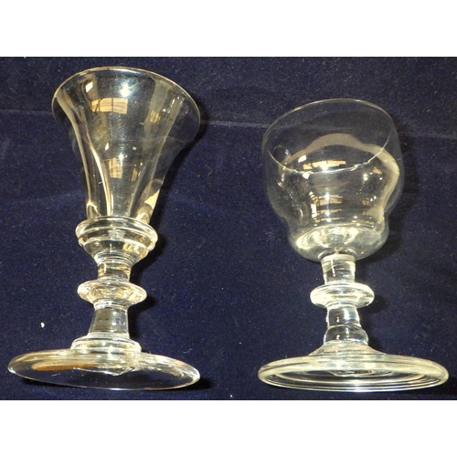 597 - A large etched stemmed glass together with four similar small shot glasses, two Georgian port glasse... 