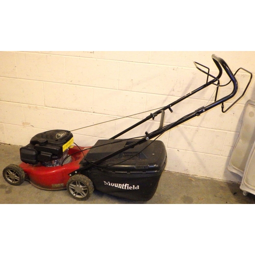 791 - A petrol self driven Mountfield lawnmower