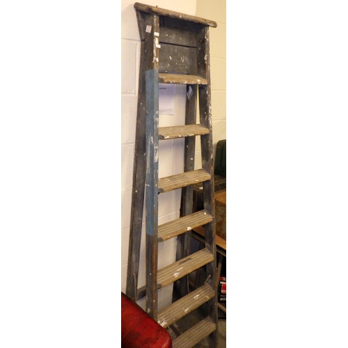 793 - A set of tall wooden step ladders