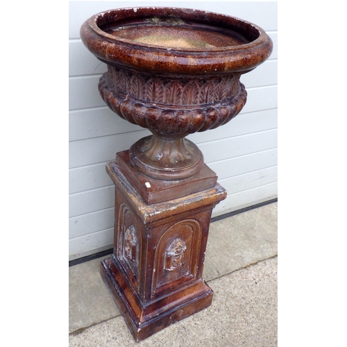 795 - A Victorian salt glaze garden urn on stand, some chips, 112cm tall