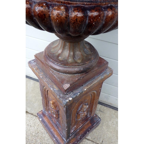 795 - A Victorian salt glaze garden urn on stand, some chips, 112cm tall