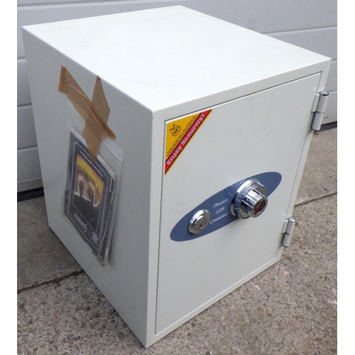 926 - A Phoenix 1220 combination safe, with key