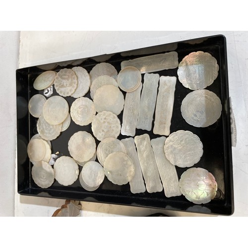 588 - A qty of mother of pearl counters, religious frame and a small portrait print (3)