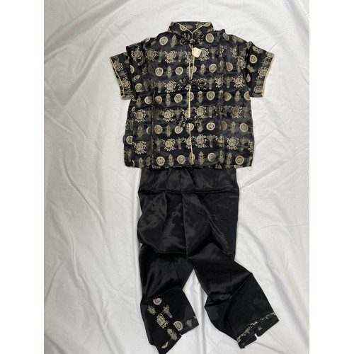 590 - A children's Chinese silk outfit together with a silk blouse