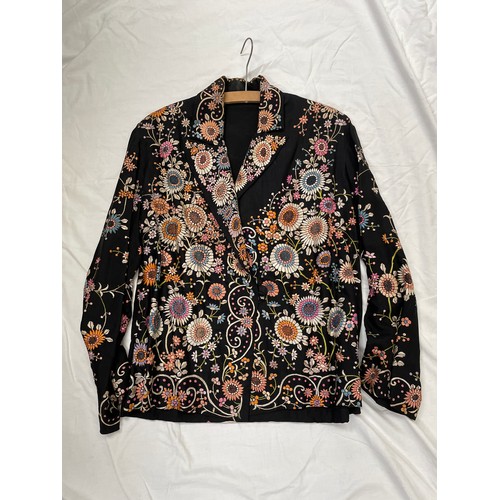 593 - A Chinses embroidered silk jacket
