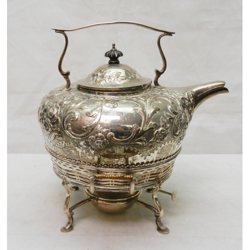 24 - An Edwardian spirit kettle on stand, Arts & Crafts influence silver having repoussé decoration, Geor... 