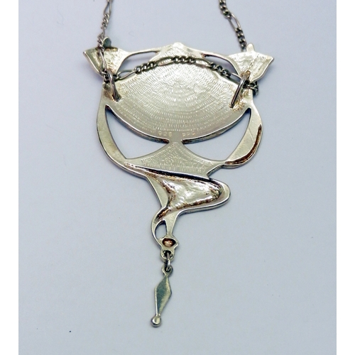 69 - A Pat Cheney Collection Art Nouveau influence pendant, white metal marked 925.  75mm pendant length