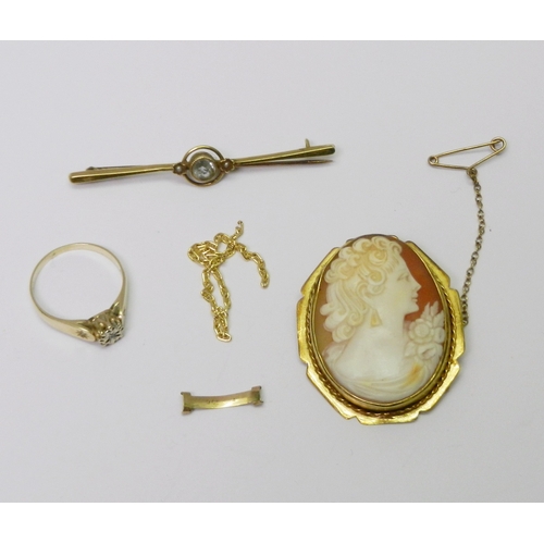 106 - A 9ct gold stone set ring, 2g gross; a shell carved cameo in a yellow metal brooch mount, 38 x 32mm ... 