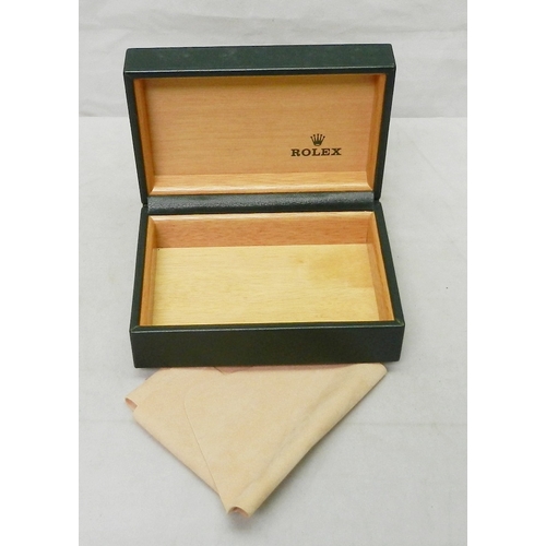 118 - A Rolex watch box, green leather.  145 x 104mm