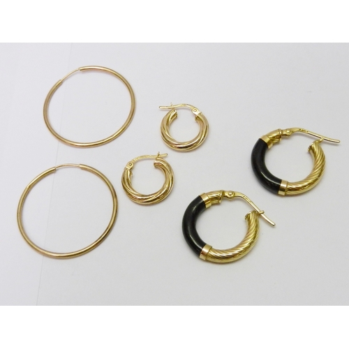 79 - Three pairs of yellow metal hoop earrings; other earrings incl white metal examples