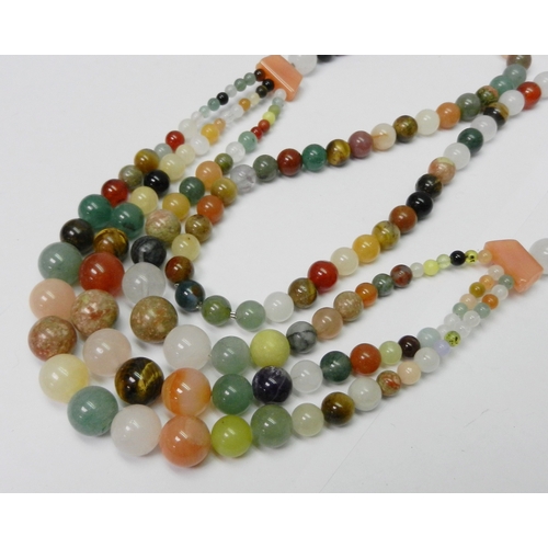 143 - Five bead necklaces incl a carnelian, bone and white metal example believed African, and a millefior... 