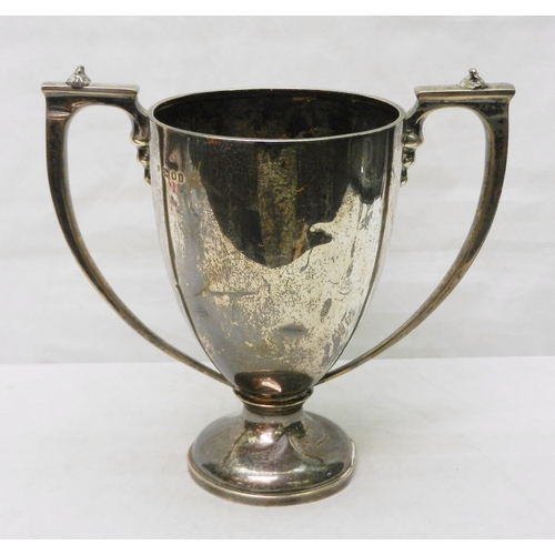 172 - A silver trophy cup, 20th cent, a/f dented.  205mm tall to the handles / 470g