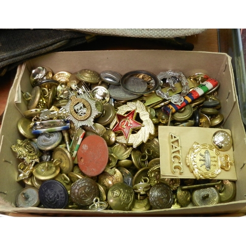 185 - A group of British army and other badges etc; a WVS medal; miniature medals; other militaria incl a ... 