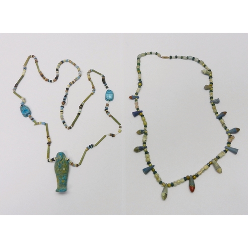 191 - Antiquarian interest: two strung necklaces of beads, including Ancient Egyptian interest, one featur... 