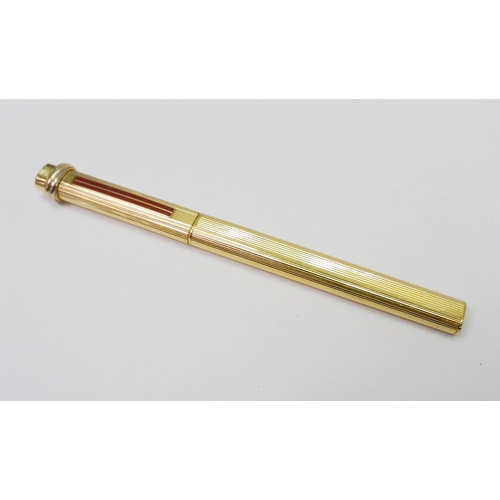 197 - A Cartier Paris gold plated ballpoint pen.  A/F, no box or papers.