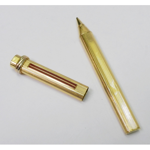 197 - A Cartier Paris gold plated ballpoint pen.  A/F, no box or papers.