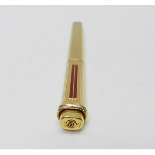 197 - A Cartier Paris gold plated ballpoint pen.  A/F, no box or papers.