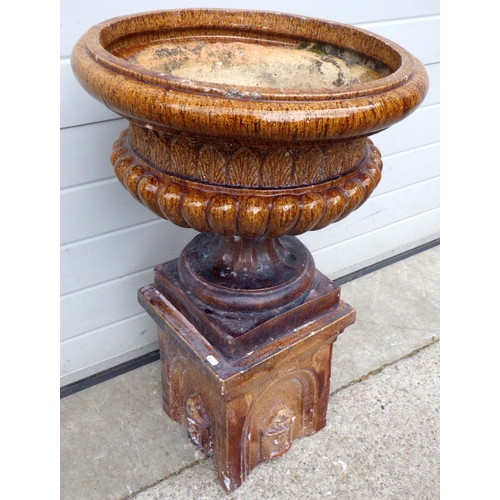 A Victorian salt glaze urn on stand, stand cut down (a/f), 83cm tall