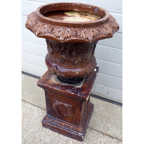 A Victorian salt glaze urn on stand, a/f, cracked, missing column, 83cm tall