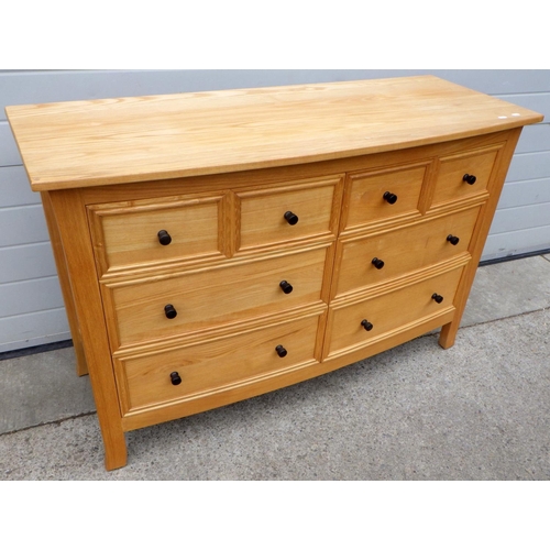 604 - A modern light oak chest of drawers, 130cm wide