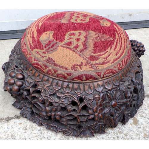 607 - A carved footstool, non symetrical pattern