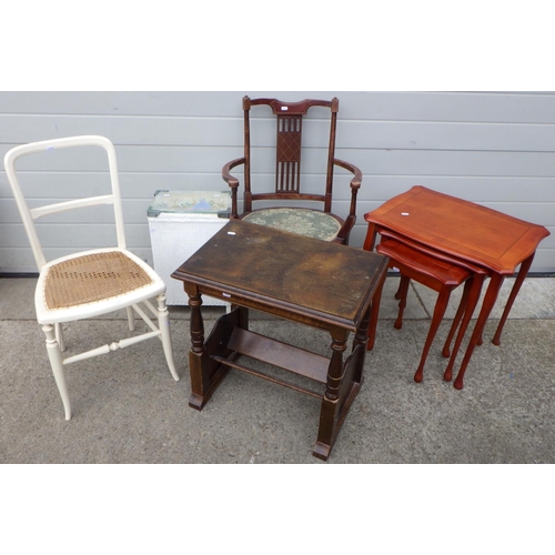 615 - A nest of occasional tables, occasional table, two chairs, linen basket (5)