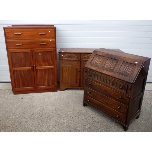 618 - A linenfold panelled oak bureau, a sideboard and a tallboy (3)