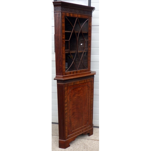 621 - A tall mahogany corner cabinet, missing moulding, 207cm tall