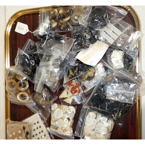 327 - A collection of vintage buttons including mother of pearl examples, some carded groups