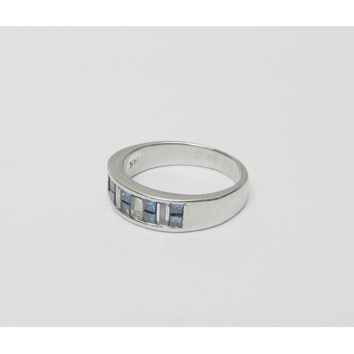 45 - An eternity-style ring comprising fourteen channel set stones being four rectangle cut diamonds and ... 