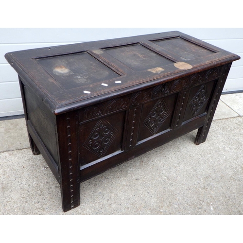 631 - A three panel oak coffer, marks, 114cm wide