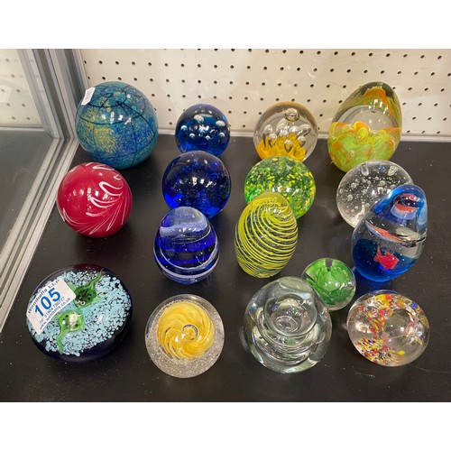 105 - A qty of misc paperweights