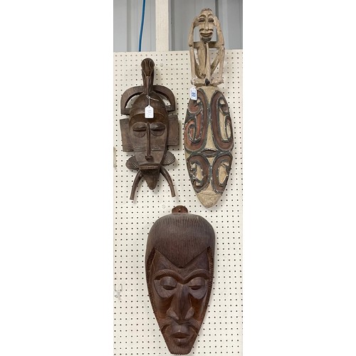 80 - Three large African masks