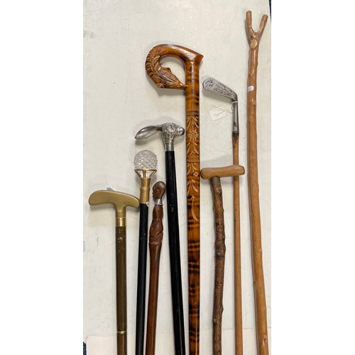 83 - A group of various walking sticks etc