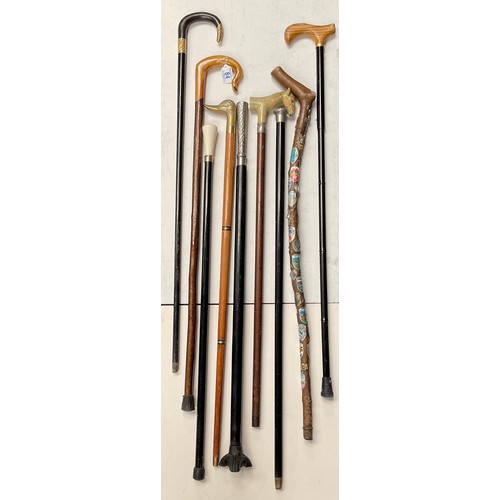 84 - A group of various walking sticks etc