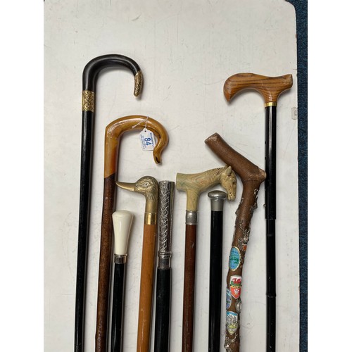 84 - A group of various walking sticks etc