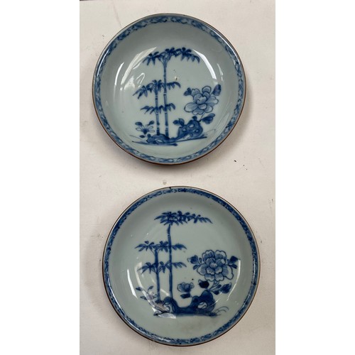 99 - Two small Nanking Cargo tea bowls together with further Oriental serving plates