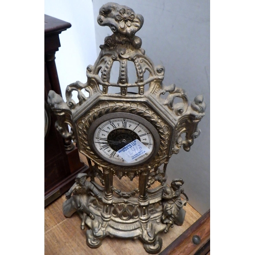 124 - An Edwardian inlaid mantle clock small walnut wall clock and a cast metal clock Af  (3)