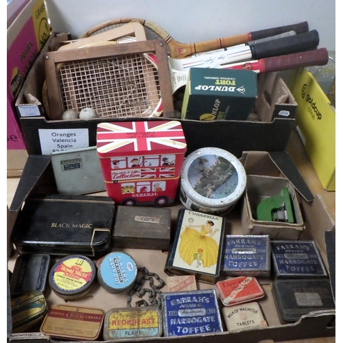 129 - A group of vintage rackets, balls and advertising tins (2)