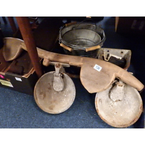 136 - A group of vintage saws, cast feeder, buckets, castors etc (qty)