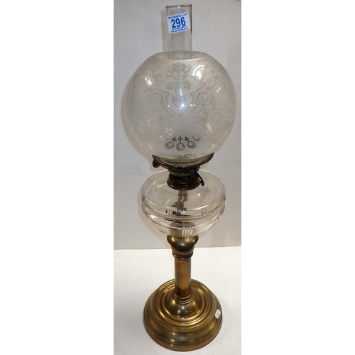 296 - A 20thC oil lamp 70cm tall