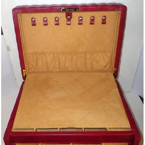 310 - A red leather jewellery box