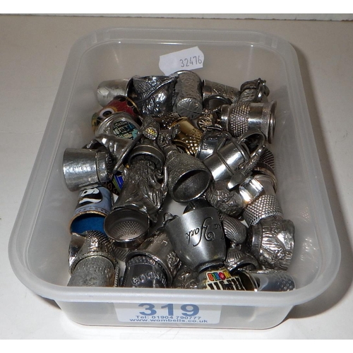 319 - A collection of misc metal thimbles