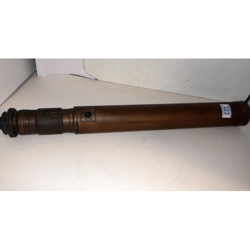 323 - A military sighting scope, brass.  595mm long