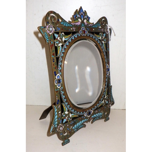 325 - A standing vanity mirror comprising a rectangular frame with an oval plate, brass with cloisonné ena... 