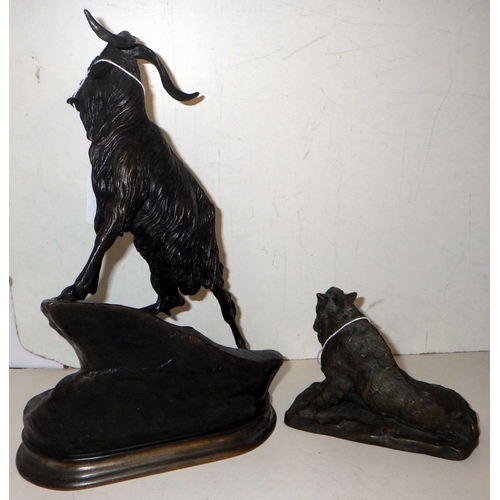 326 - A bronze depicting a mountain goat on a rock outcrop 27cm tall, signed J. Moigmiez; a bronze depicti... 