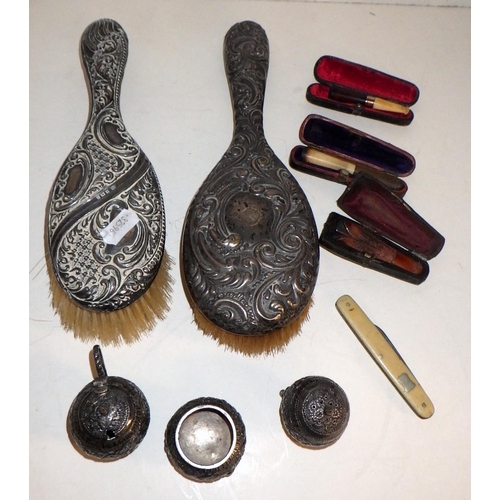 335 - Two silver backed vanity brushes, cigarette holders etc