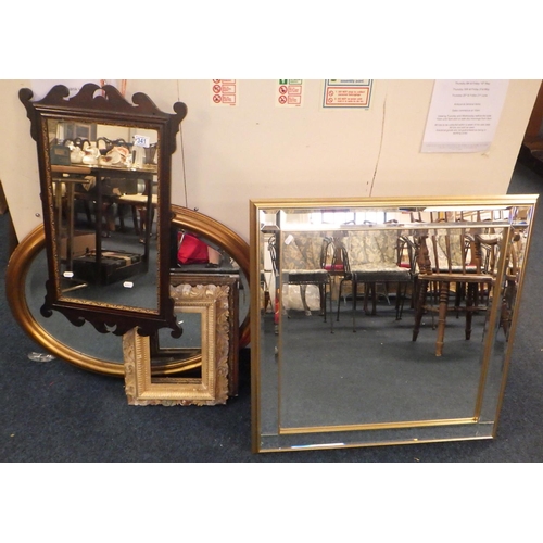 341 - A 19thC fretwork mirror together with further mirrors and two frames