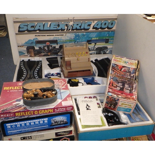 355 - A boxed Scalextric 400 together with further vintage games, moon explorer robot, Japanese Railway di... 